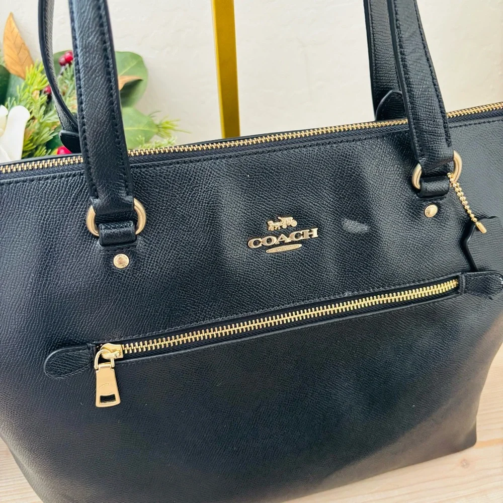 Coach sleek black
